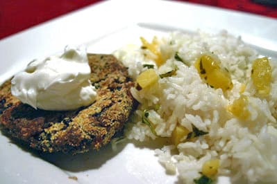 Black bean burger with pineapple rice.