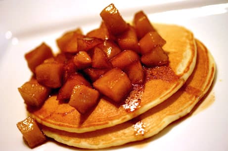 Pancakes topped with spiced apples.