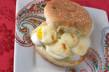 Egg sandwich with melted provolone.