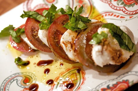 Caprese salad on a plate.