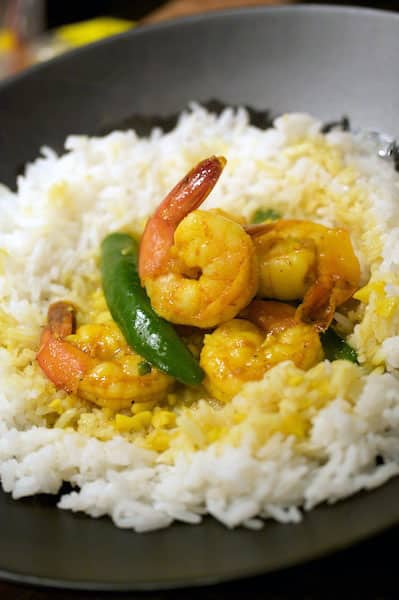 Shrimp stir-fry over rice.