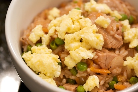 Pork fried rice topped with egg.