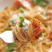 A close-up of spaghetti on a fork.