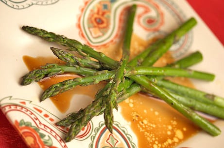 Asparagus with balsamic sauce.