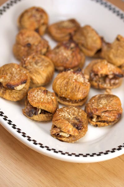 Platter of figs stuffed with walnuts.