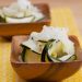 Small bowls of pickled zucchini.