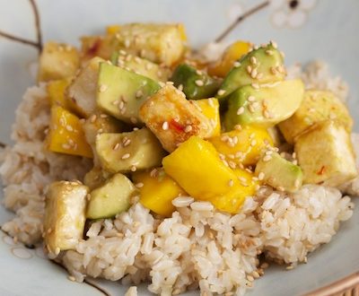 Crispy tofu curry with mango and avocado over rice.