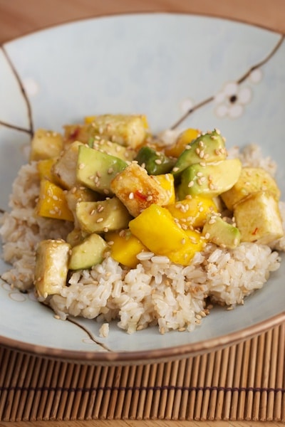 Crispy tofu curry with mango and avocado over rice.