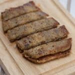 Fried eggplant and manchego sandwich sliced into strips.
