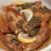 Platter of turkey scallopini with lemon and capers.