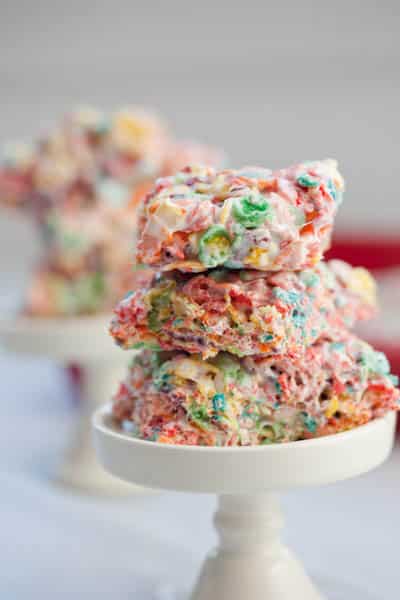 Stack of rainbow rice krispy bars.