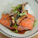 Salmon with mushrooms over rice.
