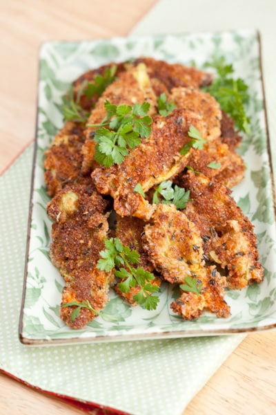 Fried squash blossoms on a plate.