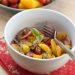 tomato salad with basil in a bowl.