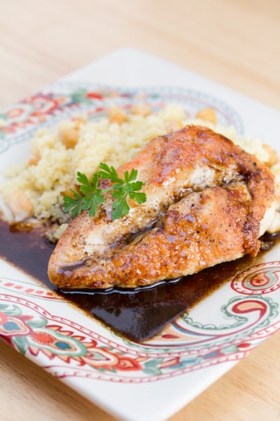 Chicken with balsamic sauce and couscous.