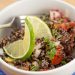 A bowl of tomato-mint quinoa salad.