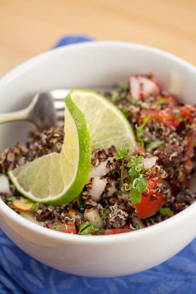 A bowl of tomato-mint quinoa salad.