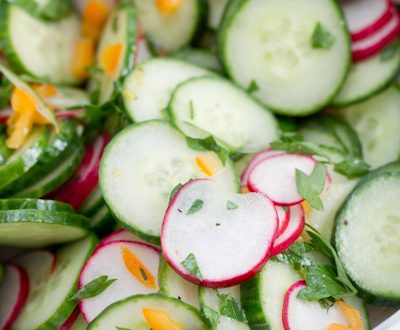 Cucumber radish salad in a bowl.