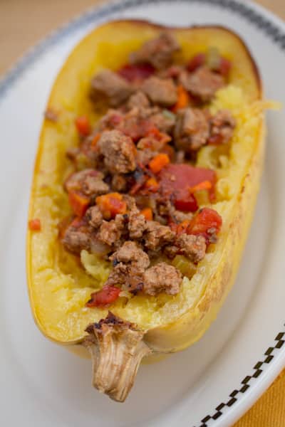 Spaghetti squash stuffed with turkey and tomato.