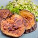 Caramelized eggplant slices with peas and fresh mint.