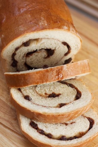 A close-up of sliced cinnamon raisin swirl bread.