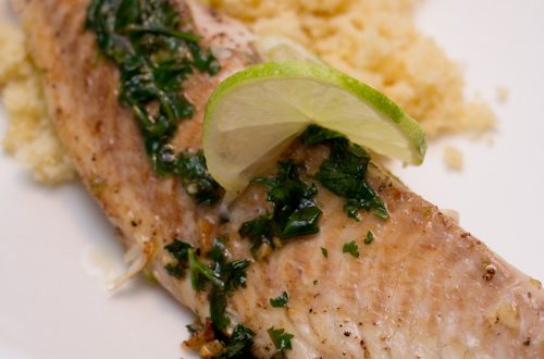 Tilapia with green sauce and couscous.
