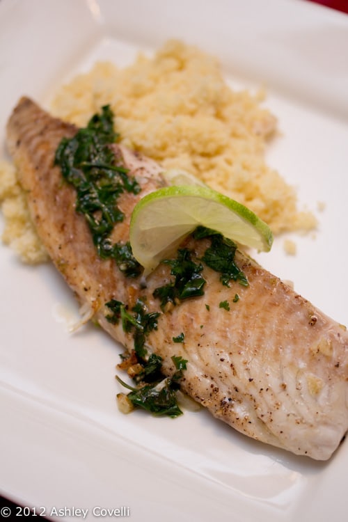 Tilapia with green sauce and couscous.