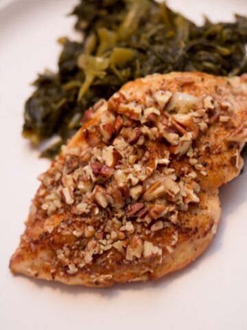 Pecan-crusted chicken with sautéed greens.