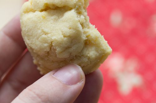 Sugar cookie with a bite taken out.