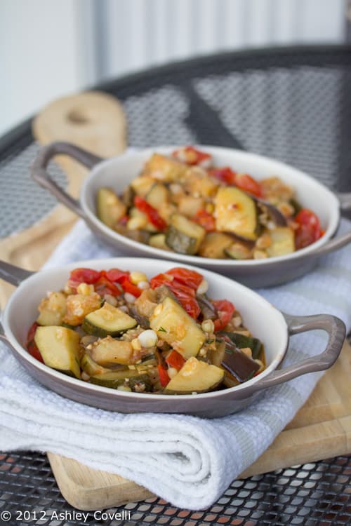 Sautéed veggies in two serving dishes.