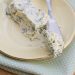 Lemon-dill compound butter with a knife for spreading.