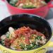 Bowls of kale and white beans with crunchy bacon panko topping.
