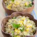 Two bowls of quinoa corn salad garnished with fresh mint.