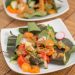 2 plates of Tatsoi Salad with Spicy Peanut Dressing.