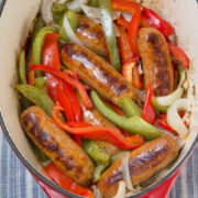 Sausage and peppers in a dutch oven.