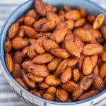 Overhead view of a bowl of spiced almonds.