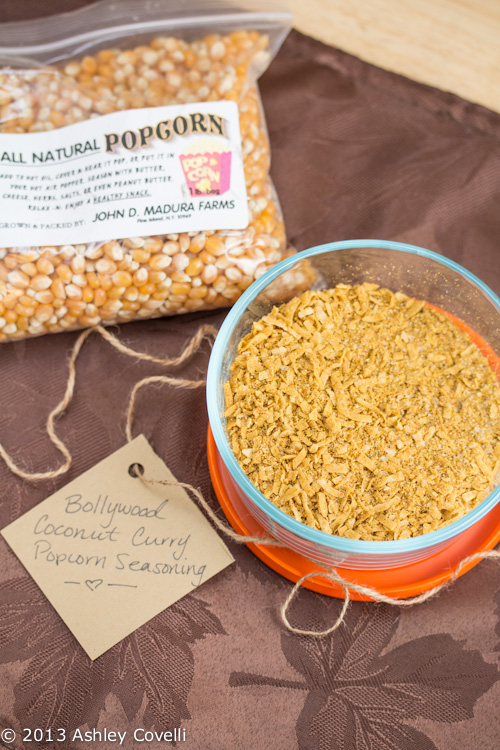 Bag of popcorn kernels with a seasoning to go alongside.