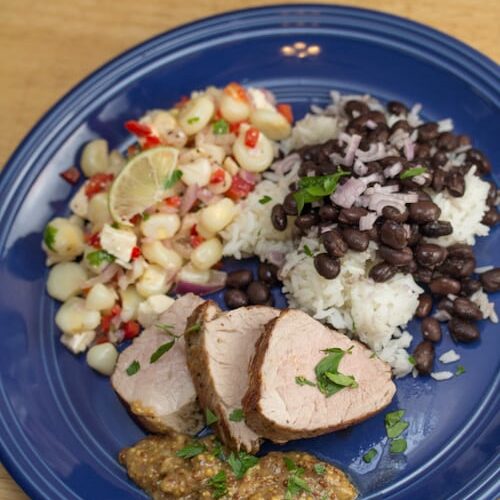 Plate of Roast Pork Tenderloin with Mustard Maple Sauce