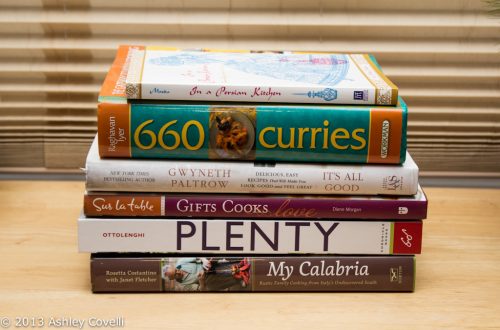 Side view of a stack of cookbooks