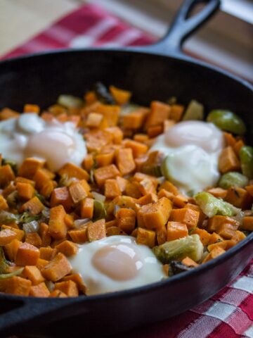 Baked Eggs with Sweet Potato and Brussels Sprouts Hash