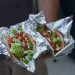 Pita sandwiches stuffed with NYC street cart-style chicken