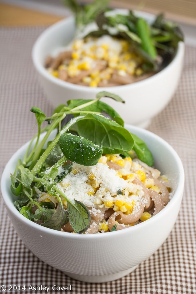 Whole Wheat Gramigna Pasta with Roasted Corn & Baby Greens