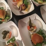Tasting portions of burgers at an event in NYC.