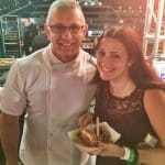 Robert Irvine and Ashley Covelli with a burger.