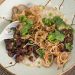 Congee & Caramelized Pork with Crispy Shallots and Black Garlic