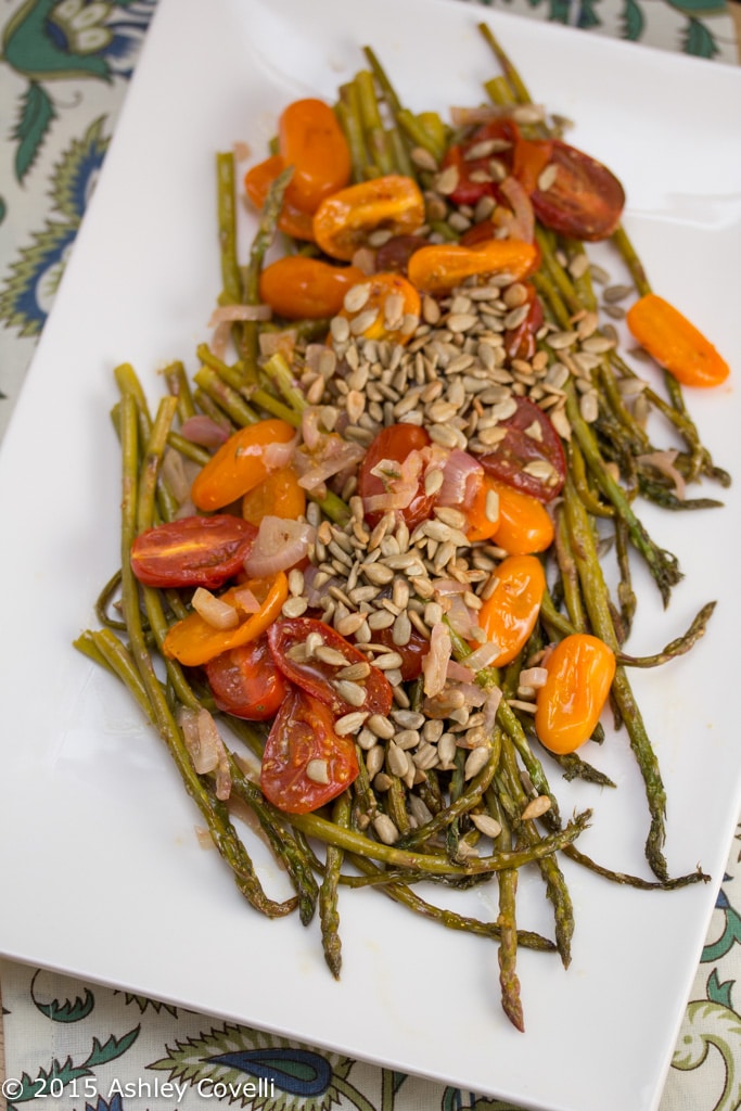 Rosemary Roasted Asparagus + Tomatoes with Toasted Sunflower Seeds