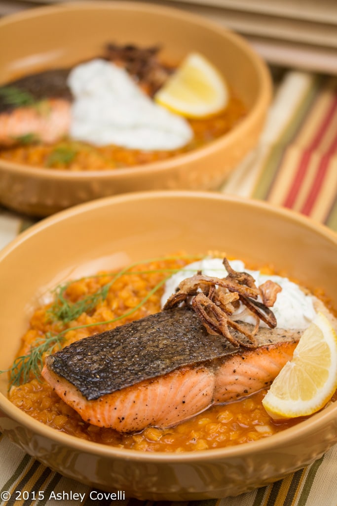 Crispy Skinned Salmon Over Red Lentils with Caper Dill Yogurt Sauce