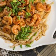 Overhead view of Spicy Shrimp + Napa Cabbage Stir-Fry served on a platter.