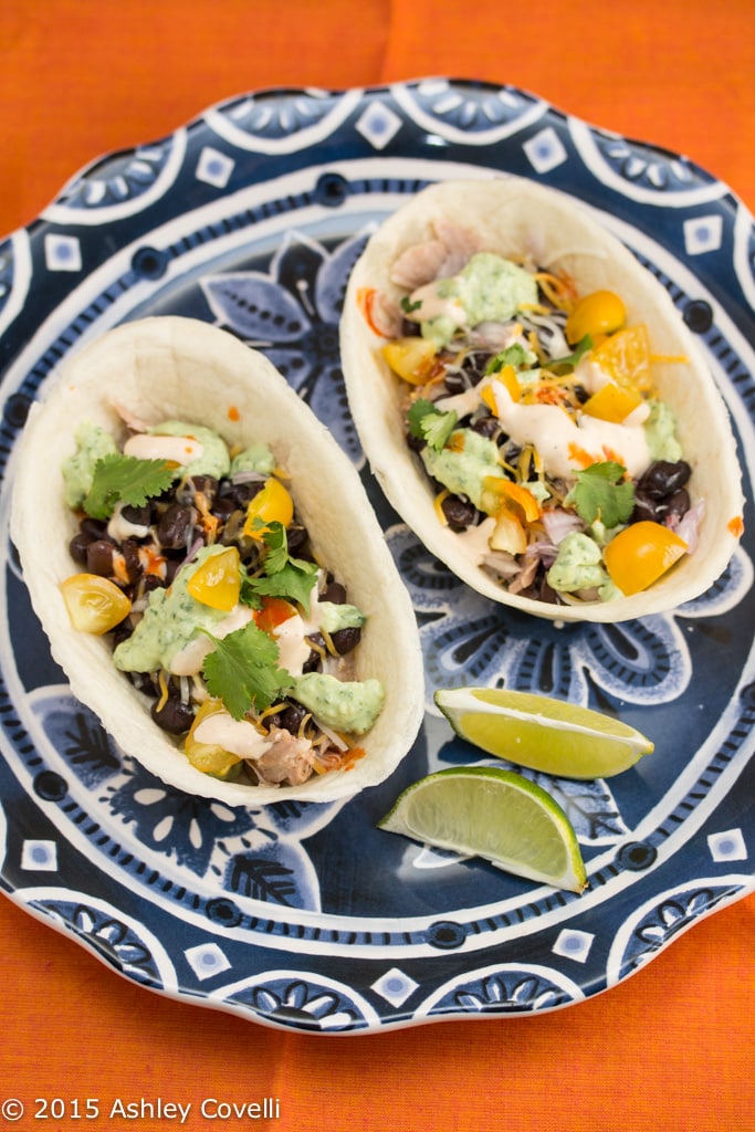 Slow Cooker Chipotle Pork Tacos with Avocado + Chipotle Cremas