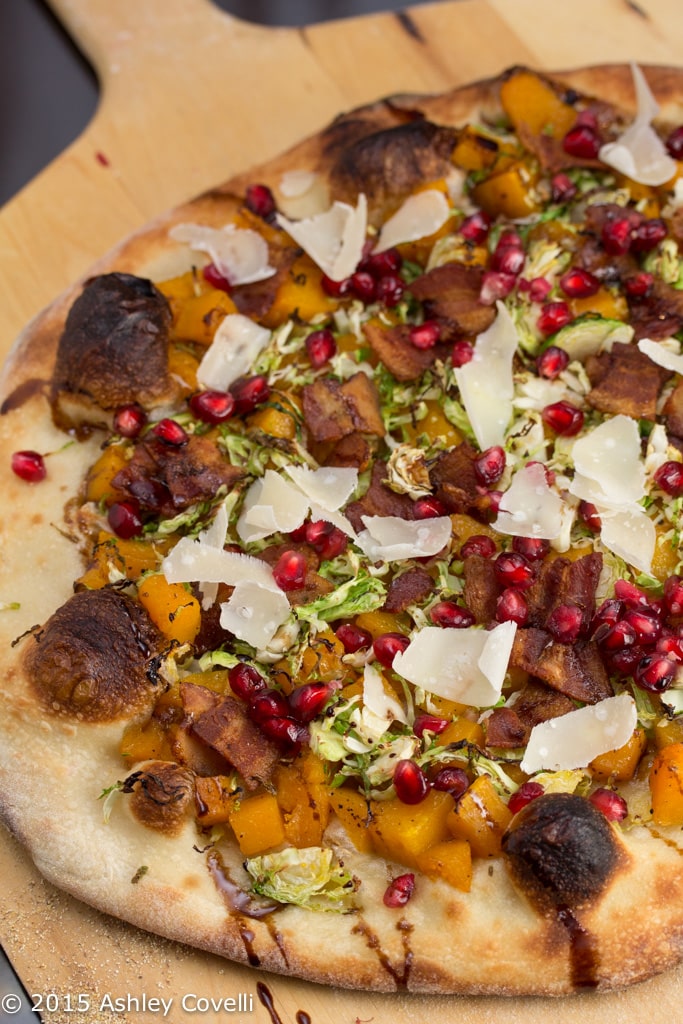 Maple Roasted Butternut Squash Pizza with Brussels Sprouts, Bacon + Pomegranate.